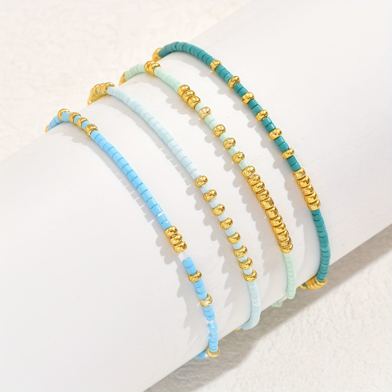 4pcs Elegant Beaded Bracelet Set - Handcrafted with Delicate Mini Beads, Stretchable for Comfort, Perfect Hand Jewelry for Women