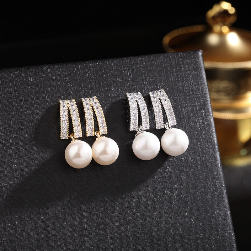 2025 Korean temperament simple zircon stud earrings women's S925 silver needle creative jewelry wholesale geometric pearl earrings