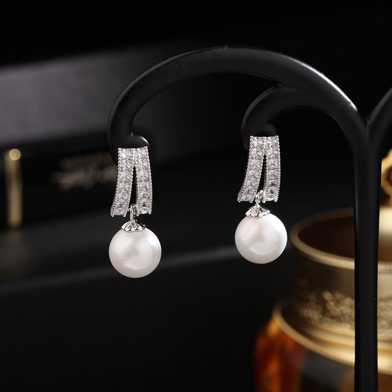 2025 Korean temperament simple zircon stud earrings women's S925 silver needle creative jewelry wholesale geometric pearl earrings