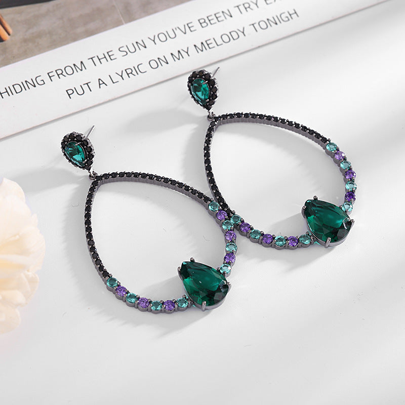 2025 earrings grandmother green zircon oval water drop gun black stud earrings fashionable exaggerated hollow geometric earrings silver needle