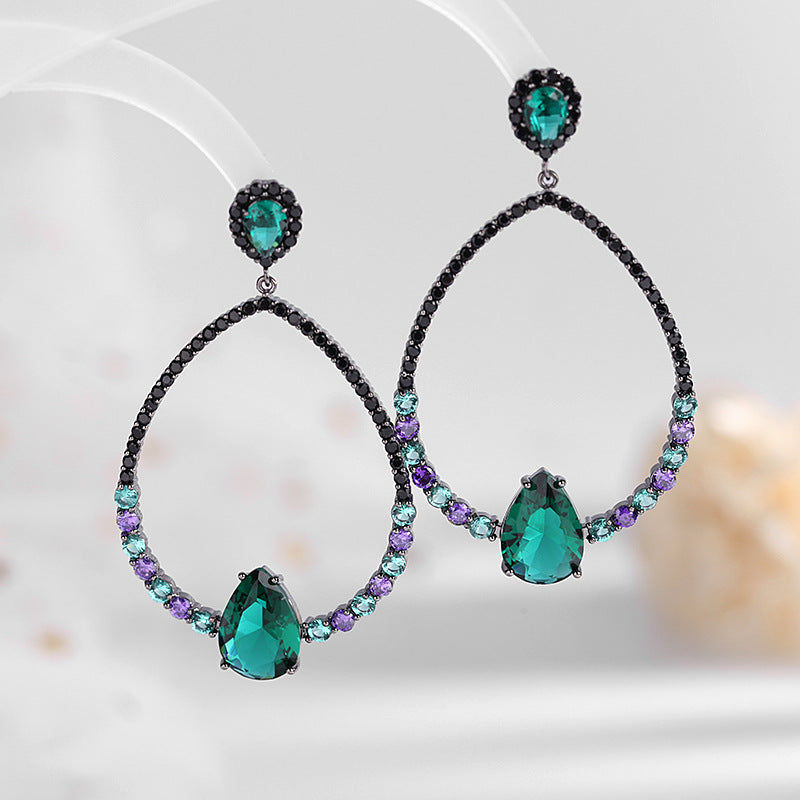 2025 earrings grandmother green zircon oval water drop gun black stud earrings fashionable exaggerated hollow geometric earrings silver needle