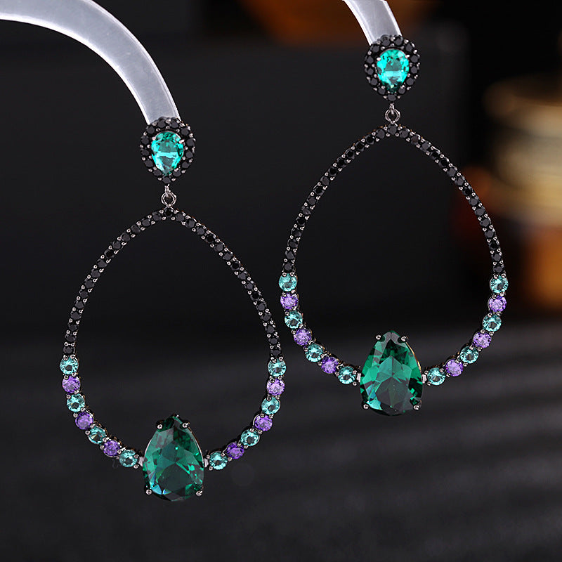 2025 earrings grandmother green zircon oval water drop gun black stud earrings fashionable exaggerated hollow geometric earrings silver needle