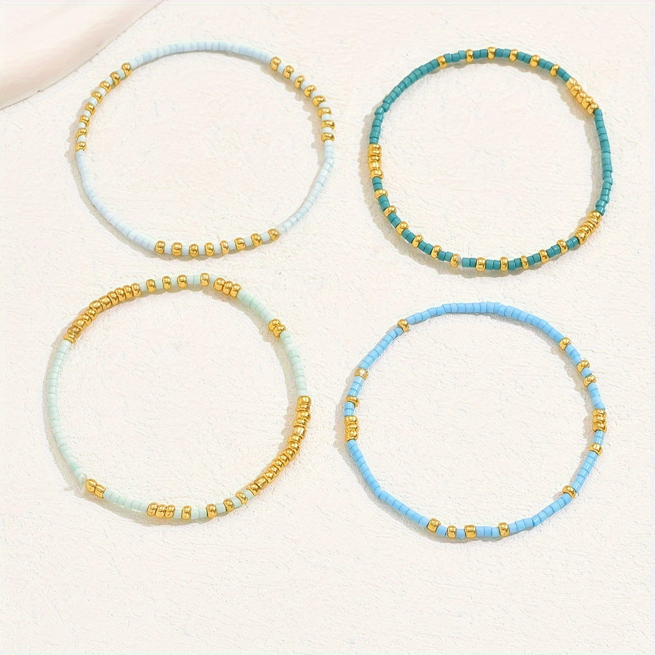 4pcs Elegant Beaded Bracelet Set - Handcrafted with Delicate Mini Beads, Stretchable for Comfort, Perfect Hand Jewelry for Women