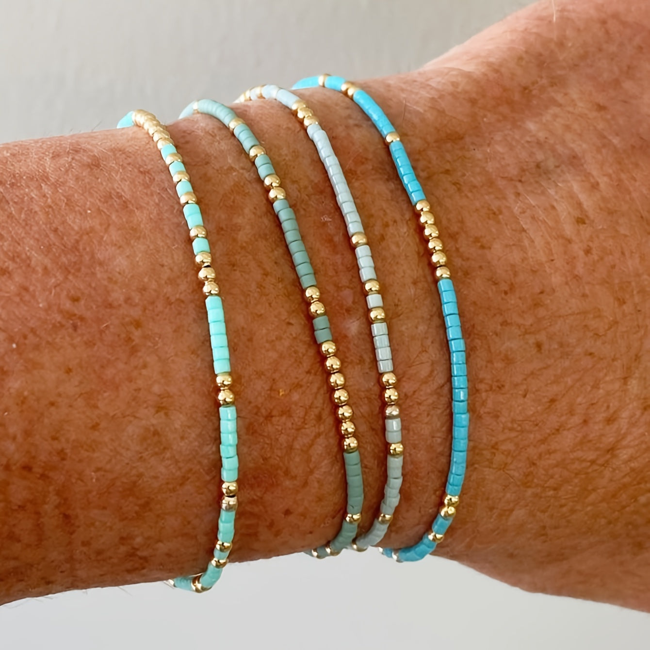 4pcs Elegant Beaded Bracelet Set - Handcrafted with Delicate Mini Beads, Stretchable for Comfort, Perfect Hand Jewelry for Women