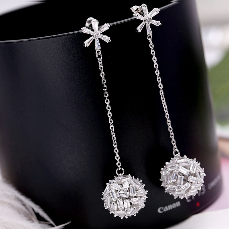 2025 Korean color zircon snowflake long temperament earrings personalized super fairy earrings S925 silver needle hollow ball earrings