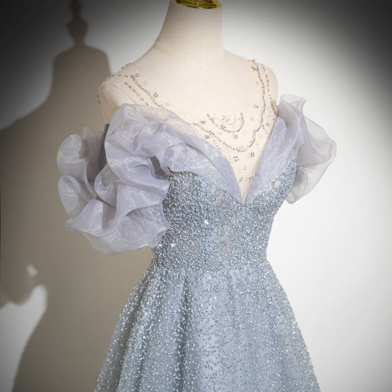 2025 Grey evening dress skirt 2025 new one-word shoulder high-end light yarn vocal art test light luxury dress manufacturer