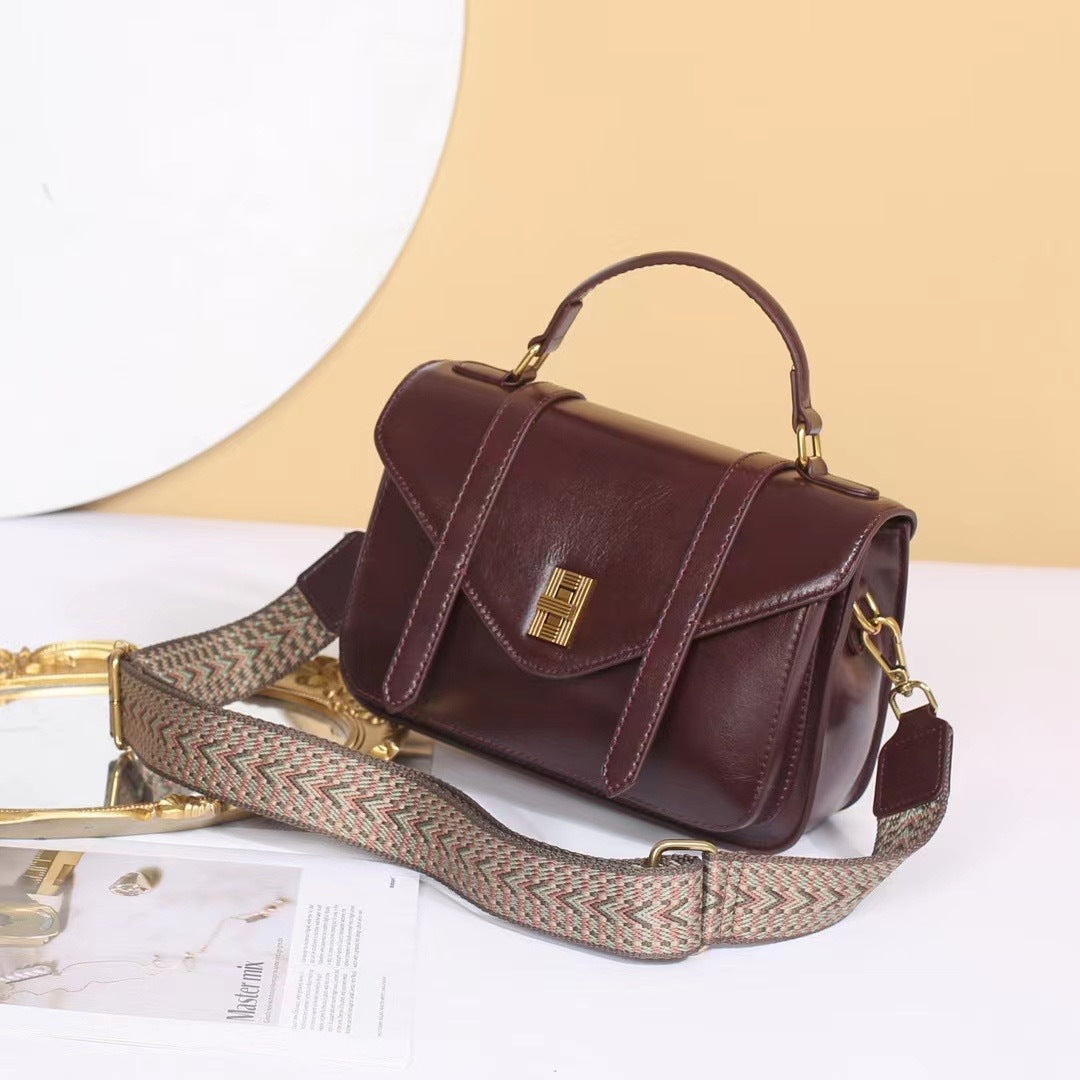 Leather locomotive bag first layer cowhide mail carrier bag vegetable tanned leather retro casual New women's bag oil wax leather bag 88820