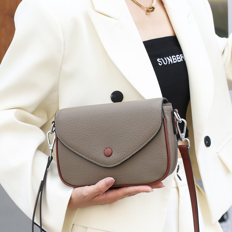 TOGO pattern cowhide small square bag women's messenger high-end leather women's bag versatile casual women's shoulder bag 9805