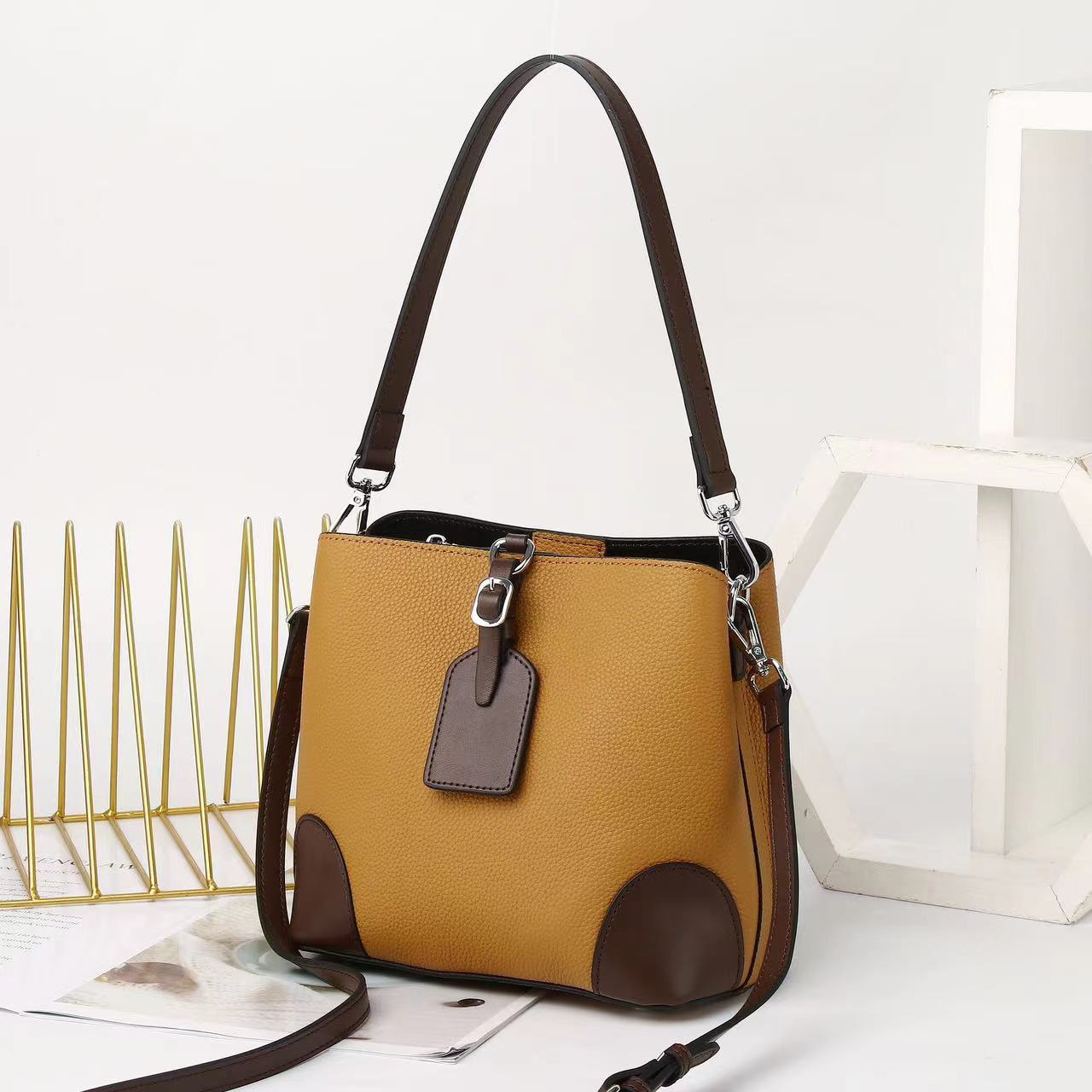 Contrasting color bucket bag new commuter leather women's bag fashion high sense versatile shoulder messenger bag bag bag 9816