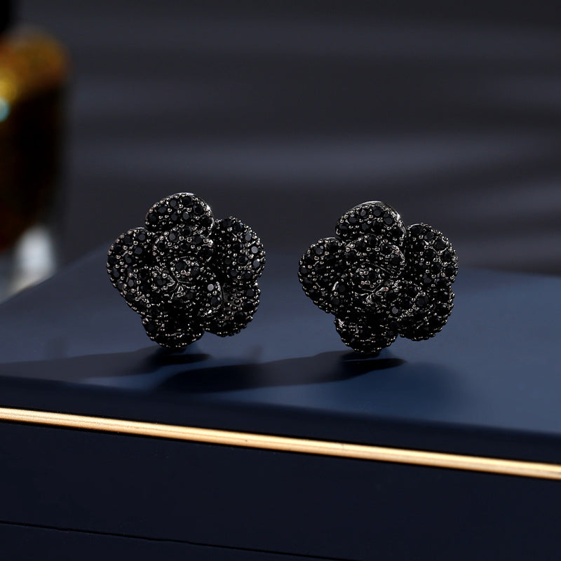 2025 Niche design high-end micro-inlaid zirconium flower earrings fashionable commuting elegant flower three-dimensional camellia stud earrings