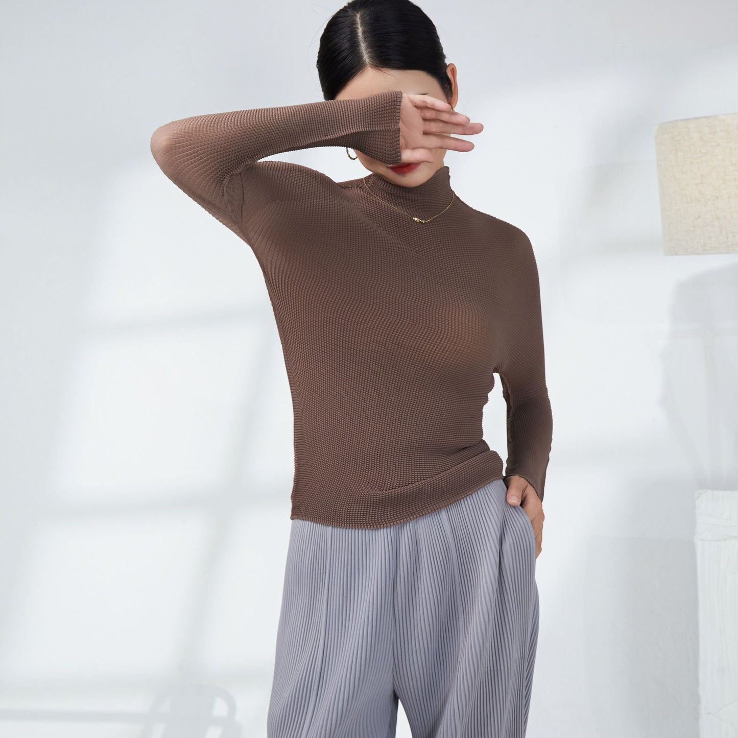 2025 Miyake basic spring and autumn bottoming shirt women's temperament turtleneck solid color slim fit simple versatile pleated long-sleeved top