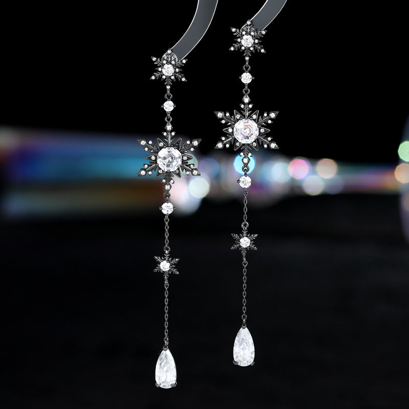 2025 New light luxury fashion autumn and winter earrings wholesale super flash zircon inlaid niche design long snowflake earrings