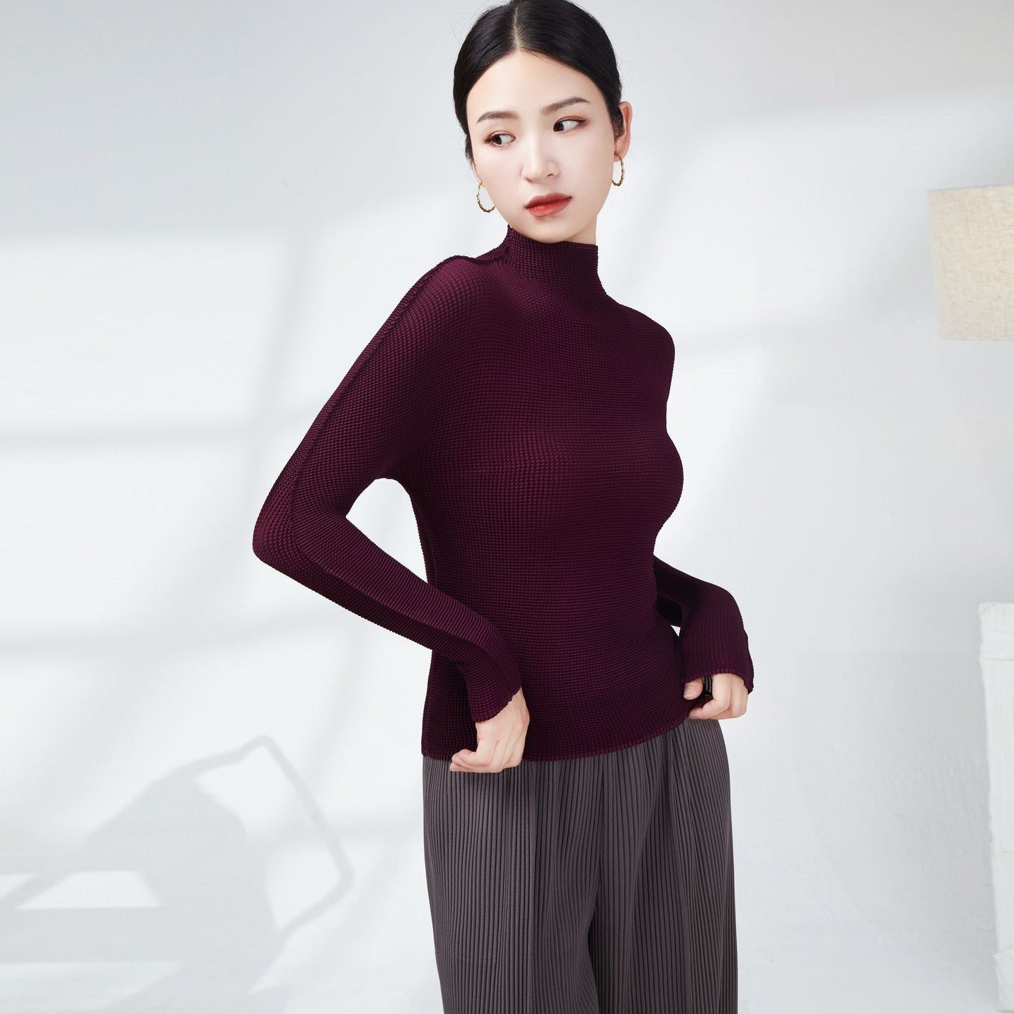 2025 Miyake basic spring and autumn bottoming shirt women's temperament turtleneck solid color slim fit simple versatile pleated long-sleeved top