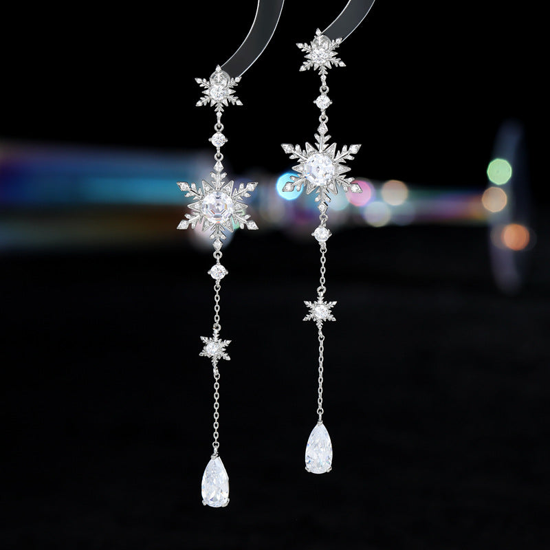 2025 New light luxury fashion autumn and winter earrings wholesale super flash zircon inlaid niche design long snowflake earrings