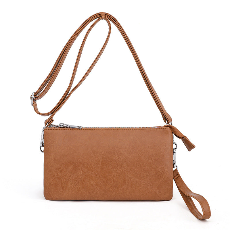 2025 Bags Women's fashion messenger bags, tote shoulder bags, mobile phone bags Women's hand commuter bags Niche bags wholesale