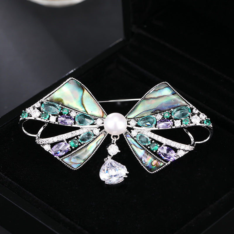 2025 High-end natural mother shell bow pearl brooch women's high-end sense elegant coat suit pin dinner corsage women