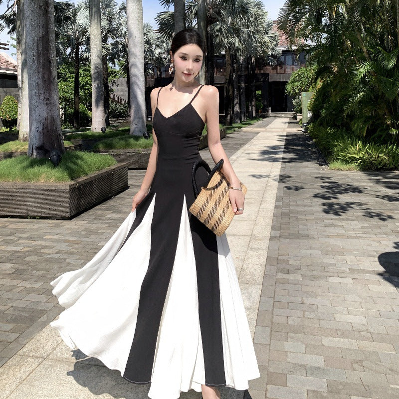 2025 Black and white contrasting color dress dress retro temperament suspender dress splicing waist holiday wear large swing dress