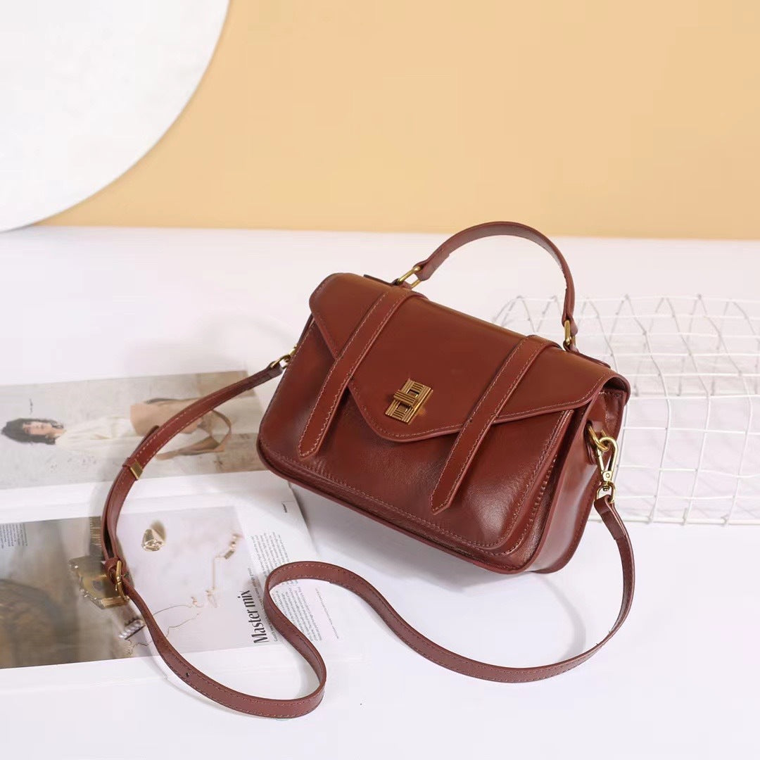 Leather locomotive bag first layer cowhide mail carrier bag vegetable tanned leather retro casual New women's bag oil wax leather bag 88820