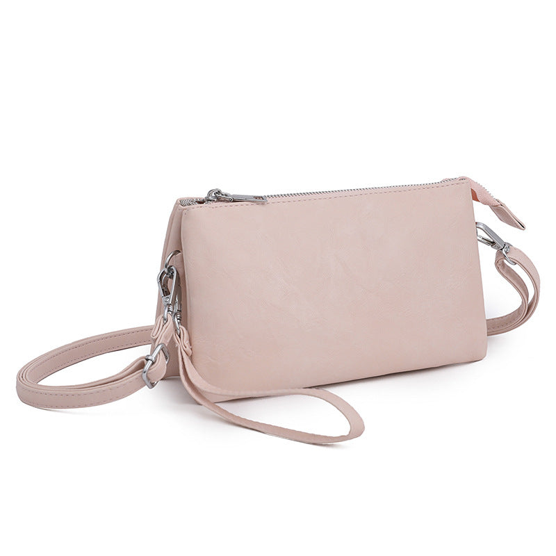 2025 Bags Women's fashion messenger bags, tote shoulder bags, mobile phone bags Women's hand commuter bags Niche bags wholesale