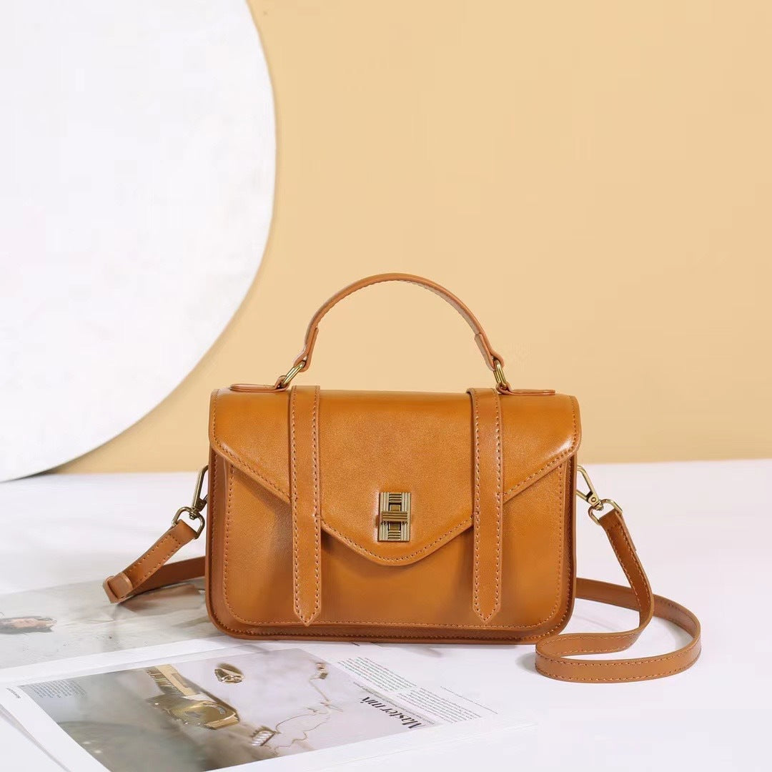 Leather locomotive bag first layer cowhide mail carrier bag vegetable tanned leather retro casual New women's bag oil wax leather bag 88820