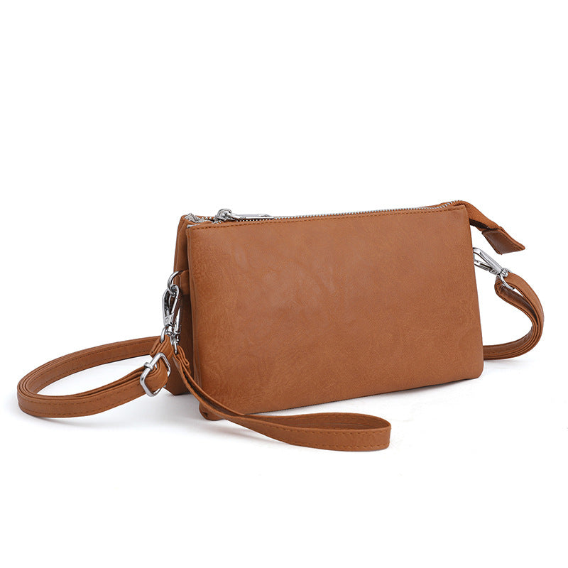 2025 Bags Women's fashion messenger bags, tote shoulder bags, mobile phone bags Women's hand commuter bags Niche bags wholesale