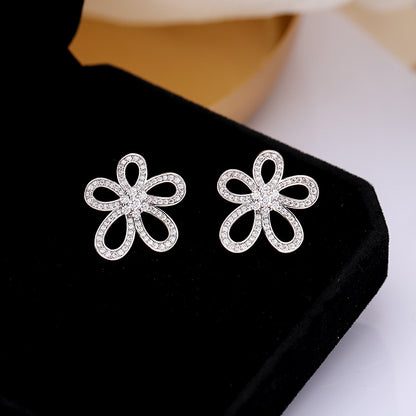 2025 Korean version of personalized jewelry simple micro inlaid zirconium sunflower earrings 925 silver needle hollow three-dimensional flower stud earrings