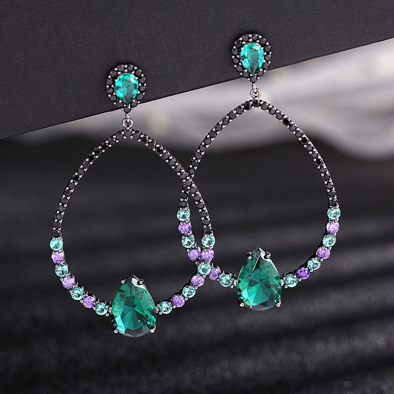 2025 earrings grandmother green zircon oval water drop gun black stud earrings fashionable exaggerated hollow geometric earrings silver needle