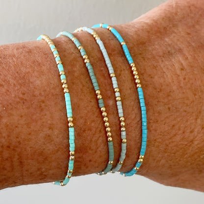 4pcs Elegant Beaded Bracelet Set - Handcrafted with Delicate Mini Beads, Stretchable for Comfort, Perfect Hand Jewelry for Women