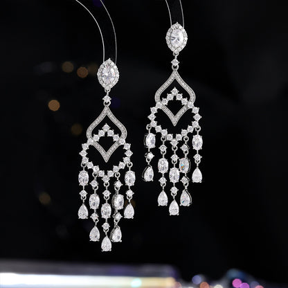 2025 Exaggerated atmosphere heavy industry earrings personalized fashion banquet dress bridal temperament light luxury long fringed water drop earrings