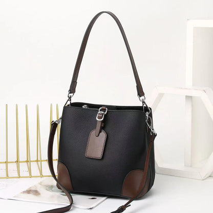 Contrasting color bucket bag  new commuter leather women's bag fashion high sense versatile shoulder messenger bag bag bag 9816
