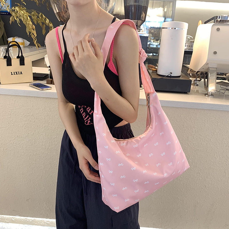 2025 ZLLKL Korean version of fashionable nylon shoulder bag popular new small fresh bow tote bag simple Popular style underarm bag women