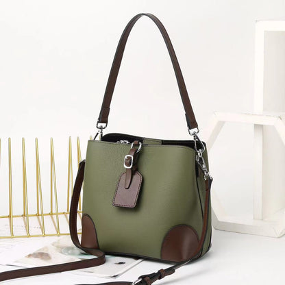 Contrasting color bucket bag  new commuter leather women's bag fashion high sense versatile shoulder messenger bag bag bag 9816