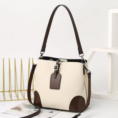 Contrasting color bucket bag  new commuter leather women's bag fashion high sense versatile shoulder messenger bag bag bag 9816