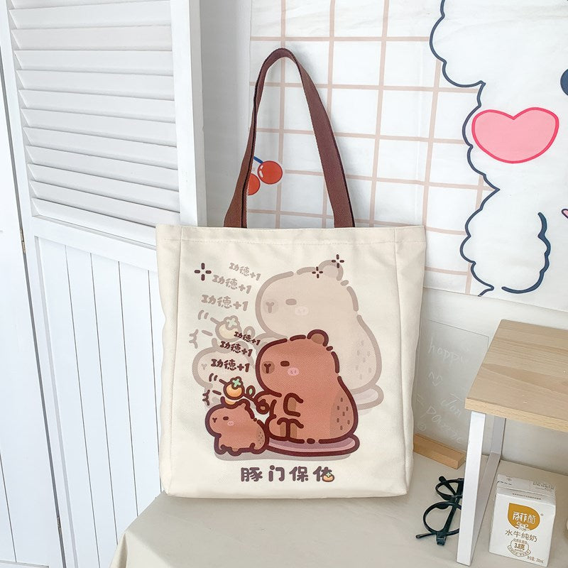 2025 ZLLKL Small fresh cartoon kapibara canvas bag popular new simple student make-up bag large capacity tote bag women