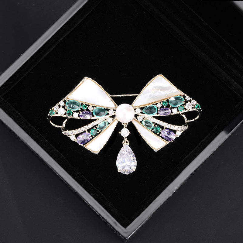 2025 High-end natural mother shell bow pearl brooch women's high-end sense elegant coat suit pin dinner corsage women