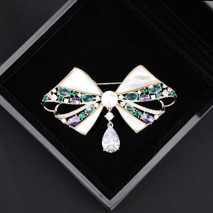 2025 High-end natural mother shell bow pearl brooch women's high-end sense elegant coat suit pin dinner corsage women