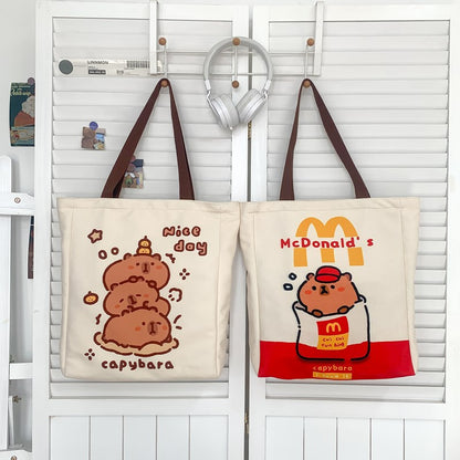 2025 ZLLKL Small fresh cartoon kapibara canvas bag popular new simple student make-up bag large capacity tote bag women