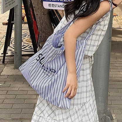 2025 ZLLKL Korean version of fashion letter large-capacity shopping bag popular new simple and versatile tote bag, Popular style striped shoulder bag