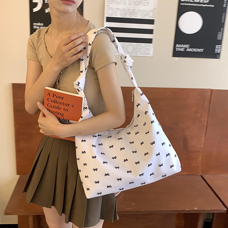 2025 ZLLKL Korean version of fashionable nylon shoulder bag popular new small fresh bow tote bag simple Popular style underarm bag women