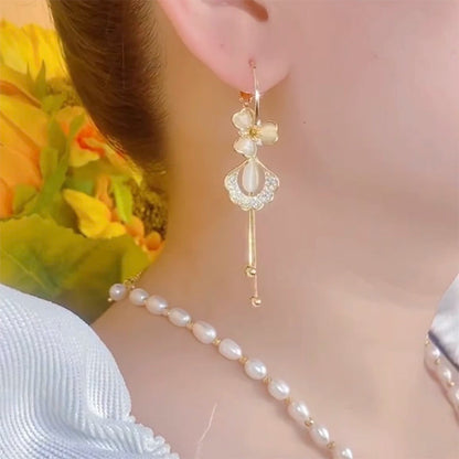 Flowers bloom, wealth, fashion and high-end opal ginkgo biloba earrings s925 silver needle long tassel face thin earrings