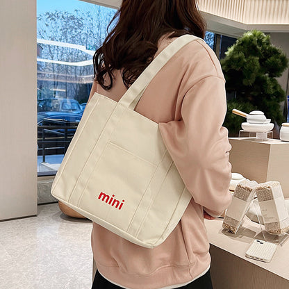 2025 ZLLKL Korean version of canvas tote bag popular new fashion and leisure simple shoulder bag versatile large-capacity student shopping bag