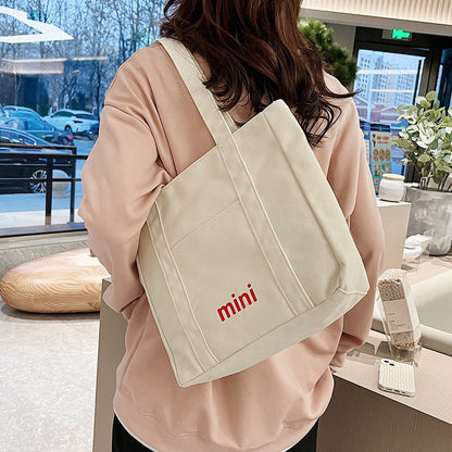 2025 ZLLKL Korean version of canvas tote bag popular new fashion and leisure simple shoulder bag versatile large-capacity student shopping bag