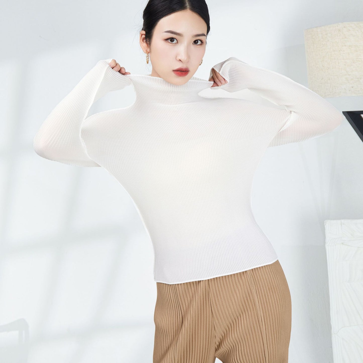 2025 Miyake basic spring and autumn bottoming shirt women's temperament turtleneck solid color slim fit simple versatile pleated long-sleeved top