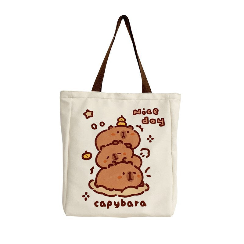 2025 ZLLKL Small fresh cartoon kapibara canvas bag popular new simple student make-up bag large capacity tote bag women