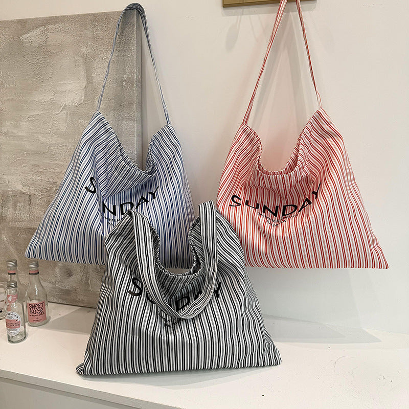 2025 ZLLKL Korean version of fashion letter large-capacity shopping bag popular new simple and versatile tote bag, Popular style striped shoulder bag