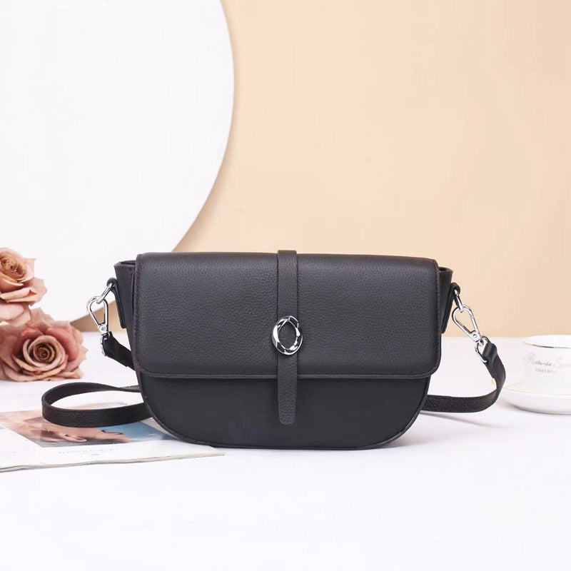 Street trend leather women's bag fashion saddle bag niche high sense TOGO pattern cowhide shoulder messenger bag 9810