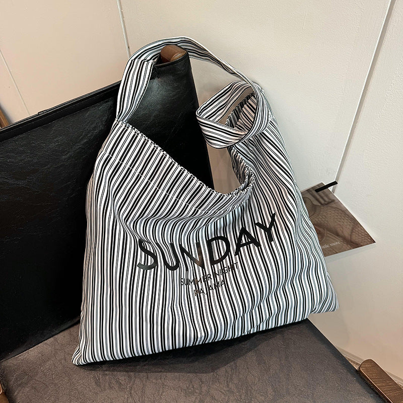 2025 ZLLKL Korean version of fashion letter large-capacity shopping bag popular new simple and versatile tote bag, Popular style striped shoulder bag