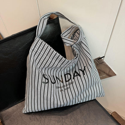 2025 ZLLKL Korean version of fashion letter large-capacity shopping bag popular new simple and versatile tote bag, Popular style striped shoulder bag