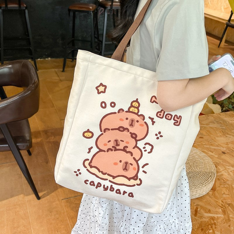 2025 ZLLKL Small fresh cartoon kapibara canvas bag popular new simple student make-up bag large capacity tote bag women
