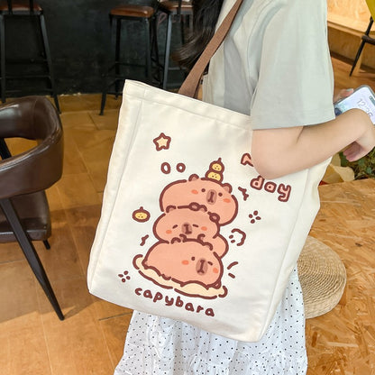 2025 ZLLKL Small fresh cartoon kapibara canvas bag popular new simple student make-up bag large capacity tote bag women